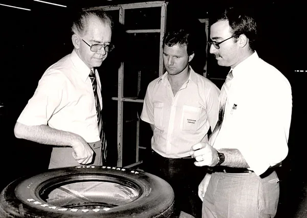 john-kelsey-inspecting-tire